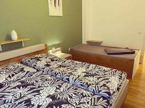 Ein Bett oder Betten in einem Zimmer der Unterkunft Ferienwohnung Martin