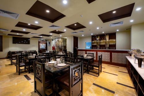 Ein Restaurant oder anderes Speiselokal in der Unterkunft TK123 Hanoi Hotel 