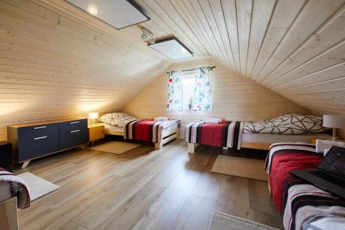 Katil atau katil-katil dalam bilik di Apartamenty Białe Brzozy