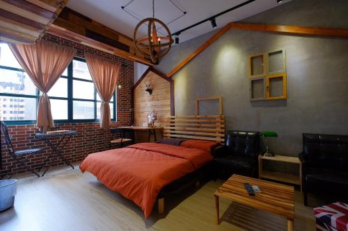 Ένα ή περισσότερα κρεβάτια σε δωμάτιο στο House Inn House