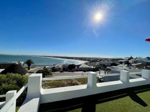 a view of the beach from the roof of a house at 16 Mile View in Yzerfontein