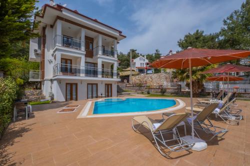 Πισίνα στο ή κοντά στο Infinity Olympia Villas