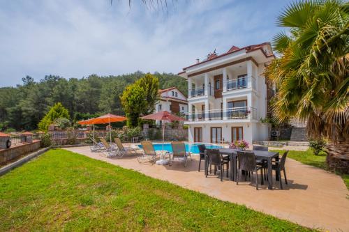 Πισίνα στο ή κοντά στο Infinity Olympia Villas