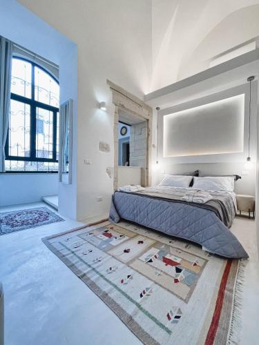 Ένα ή περισσότερα κρεβάτια σε δωμάτιο στο La Curia