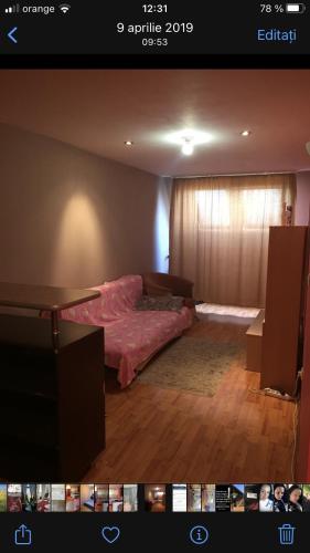 Een bed of bedden in een kamer bij Apartament 2 camere