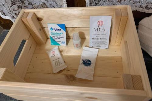 a wooden box with products on top of it at La Terrazza sulle Apuane in Fivizzano
