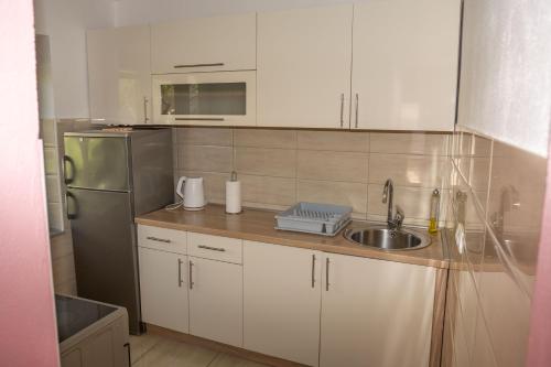Apartments Unoにあるキッチンまたは簡易キッチン