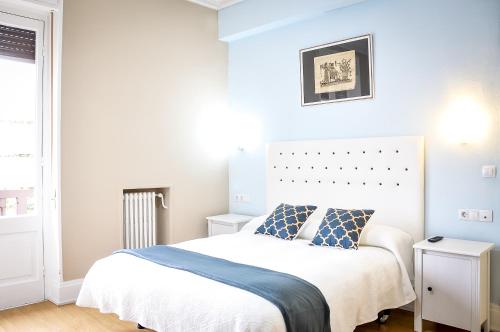Postel nebo postele na pokoji v ubytování Hotel Neguri