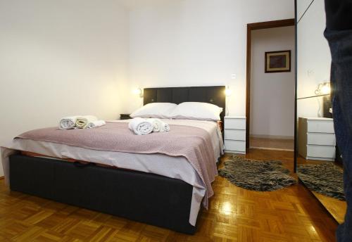 מיטה או מיטות בחדר ב-Apartment Marita