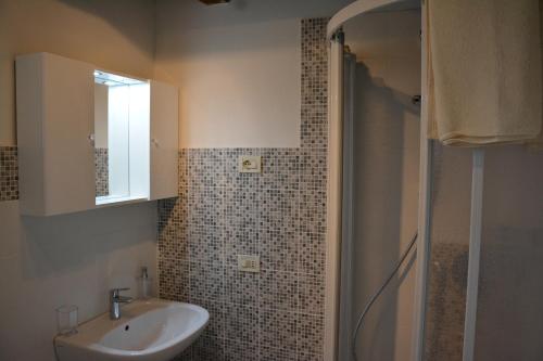 Kylpyhuone majoituspaikassa Apartment Magalita