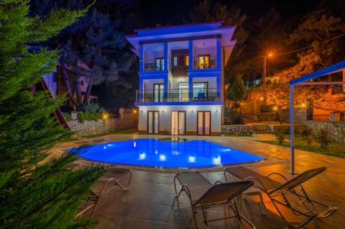 Πισίνα στο ή κοντά στο Infinity Olympia Villas