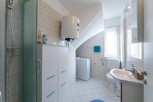 Kuchyň nebo kuchyňský kout v ubytování Apartman ZAZU