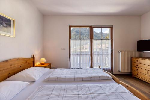Cama o camas de una habitación en Peintenhof Typ D