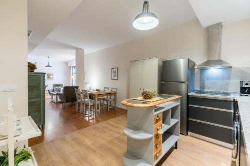 Kjøkken eller kjøkkenkrok på Apartamentos RG Suites Sierpes 54