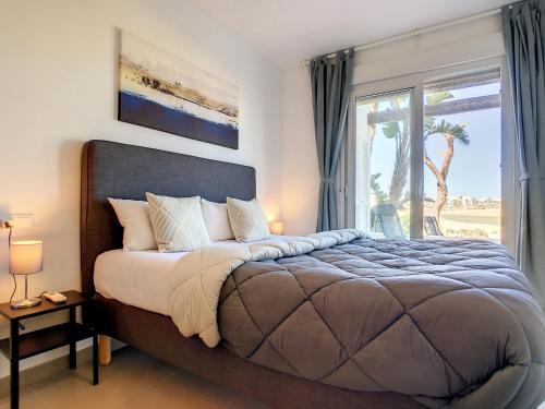 En eller flere senge i et værelse på Las Terrazas de La Torre Golf - 6609