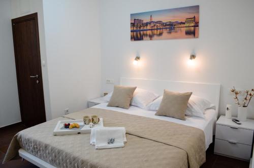 Posteľ alebo postele v izbe v ubytovaní Armanda Rooms