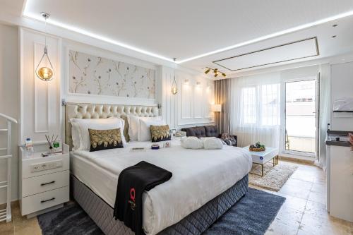 Säng eller sängar i ett rum på Sadaret Hotel&Suites Istanbul -Best Group Hotels