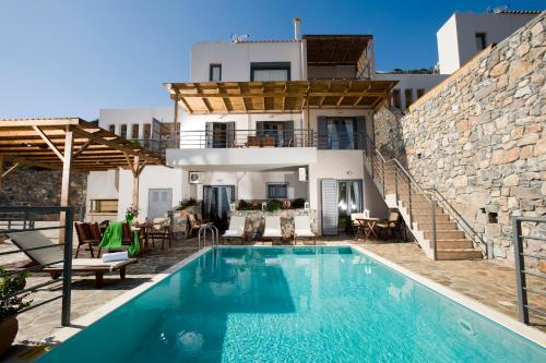 Bazén v ubytování Elounda Solfez Villas nebo v jeho okolí