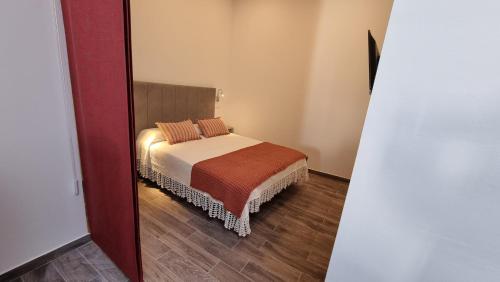 Een bed of bedden in een kamer bij Casa Tamadaba Agaete