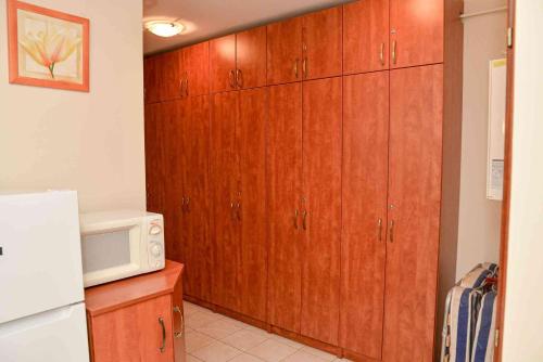 Dapur atau dapur kecil di Apartman Ottó