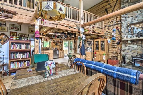 a dining room with a wooden table and chairs at Shenandoah Valley Home - 9 Mi to Natl Park! in Front Royal