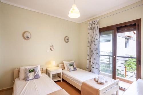 Postel nebo postele na pokoji v ubytování Sea side home Valentina