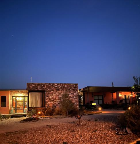 a building at night with a blue sky at Casa Pavo Real en el Viñedo El Pavo Real del Campo in San Miguel de Allende