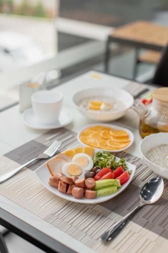 a plate of food sitting on top of a table at Safarov's Family Hostel in Tashkent