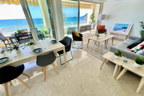 a living room with a view of the ocean at Magnificent 82m With Terrace And In Front Of Sea in La Seyne-sur-Mer