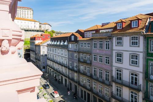 a view of a city street with buildings at Porto River Infante in Porto