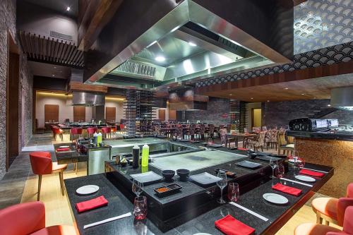 a bar with a pool table in a restaurant at Royalton Hideaway Saint Lucia, An Autograph Collection All-Inclusive Resort - Adults Only in Gros Islet