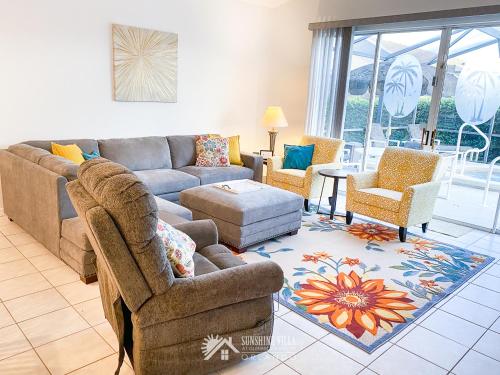 a living room with a couch and two chairs at Affordable Luxury Home Near Walt Disney World - Sunshine Villa at Glenbrook Resort, Orlando, Florida in Orlando