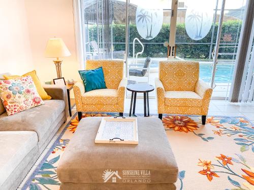a living room with a couch and two chairs at Affordable Luxury Home Near Walt Disney World - Sunshine Villa at Glenbrook Resort, Orlando, Florida in Orlando