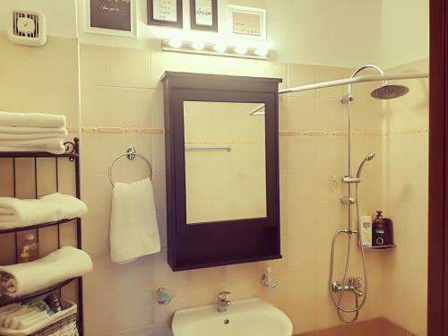 A bathroom at Lux House next to the Airport of Athens. Transport 24h