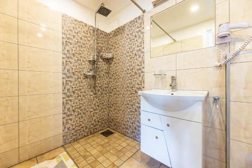 Ванна кімната в Palanga Deluxe
