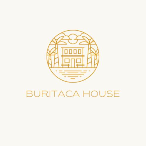 un logo per una casa di burrito con un edificio di Buritaca House a Buritaca