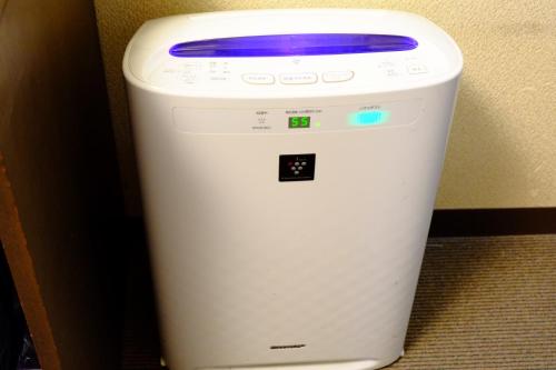 a computer with a frisbee on top of it at Hotel Route-Inn Court Kofu Isawa in Fuefuki