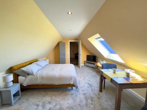 Кровать или кровати в номере Vallay Sands