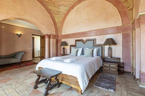 a bedroom with a large bed in a room at Quinta Dionysus by Algarve Holidays in Albufeira