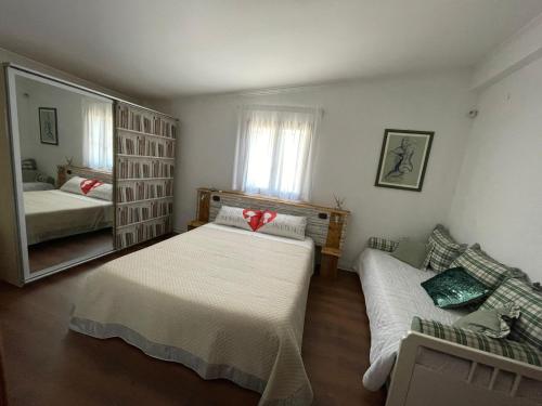 Postel nebo postele na pokoji v ubytování B&b da Maria