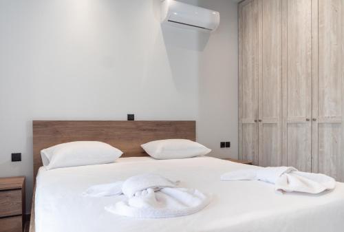 Ένα ή περισσότερα κρεβάτια σε δωμάτιο στο Apartment Lazarous 3
