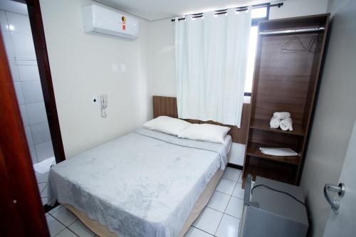 Cama o camas de una habitación en Hotel Campina Executivo