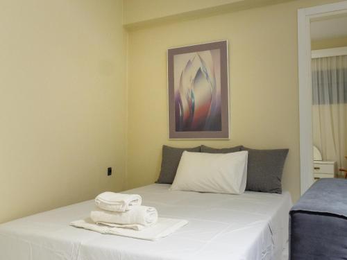 Ένα ή περισσότερα κρεβάτια σε δωμάτιο στο Apartment Lazarous 1
