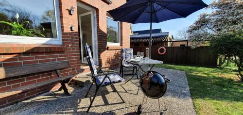 Κήπος έξω από το Vogelkoje - Urlaub an der Nordsee in Nordfriesland