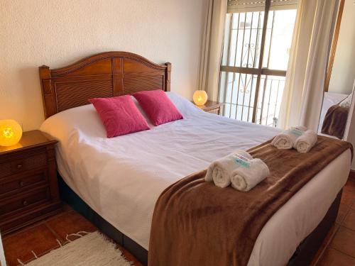 Posteľ alebo postele v izbe v ubytovaní Precioso dúplex céntrico con terraza de 25 m²