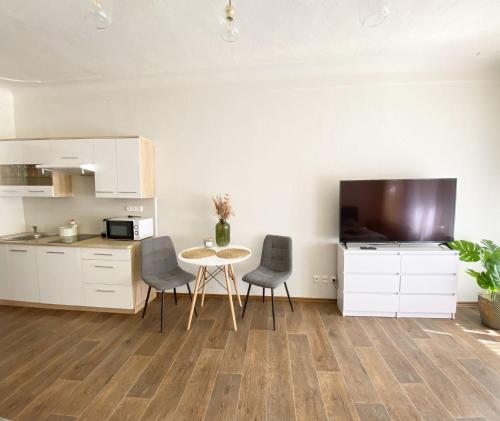 TV a/nebo společenská místnost v ubytování Kovarik Apartments I