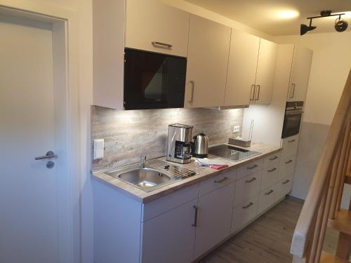 Dapur atau dapur kecil di Gästehaus am Bahnhof Norddeich