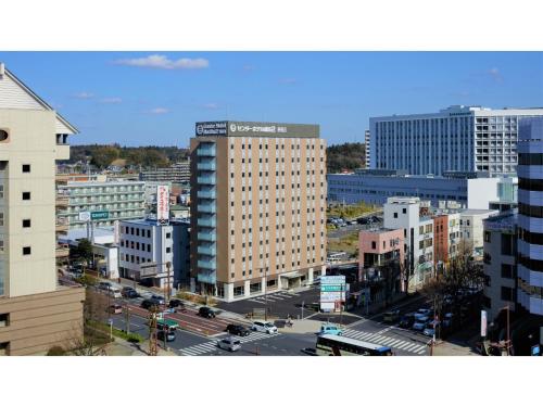 an aerial view of a city with a tall building at Center Hotel Narita 2 R51 - Vacation STAY 43386v in Narita