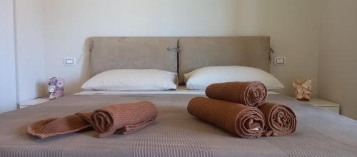 Cama o camas de una habitación en KatlantiK Beach House Deluxe