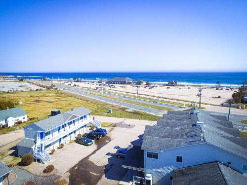 an aerial view of a building and the beach at Scarborough Beach Motel in Narragansett